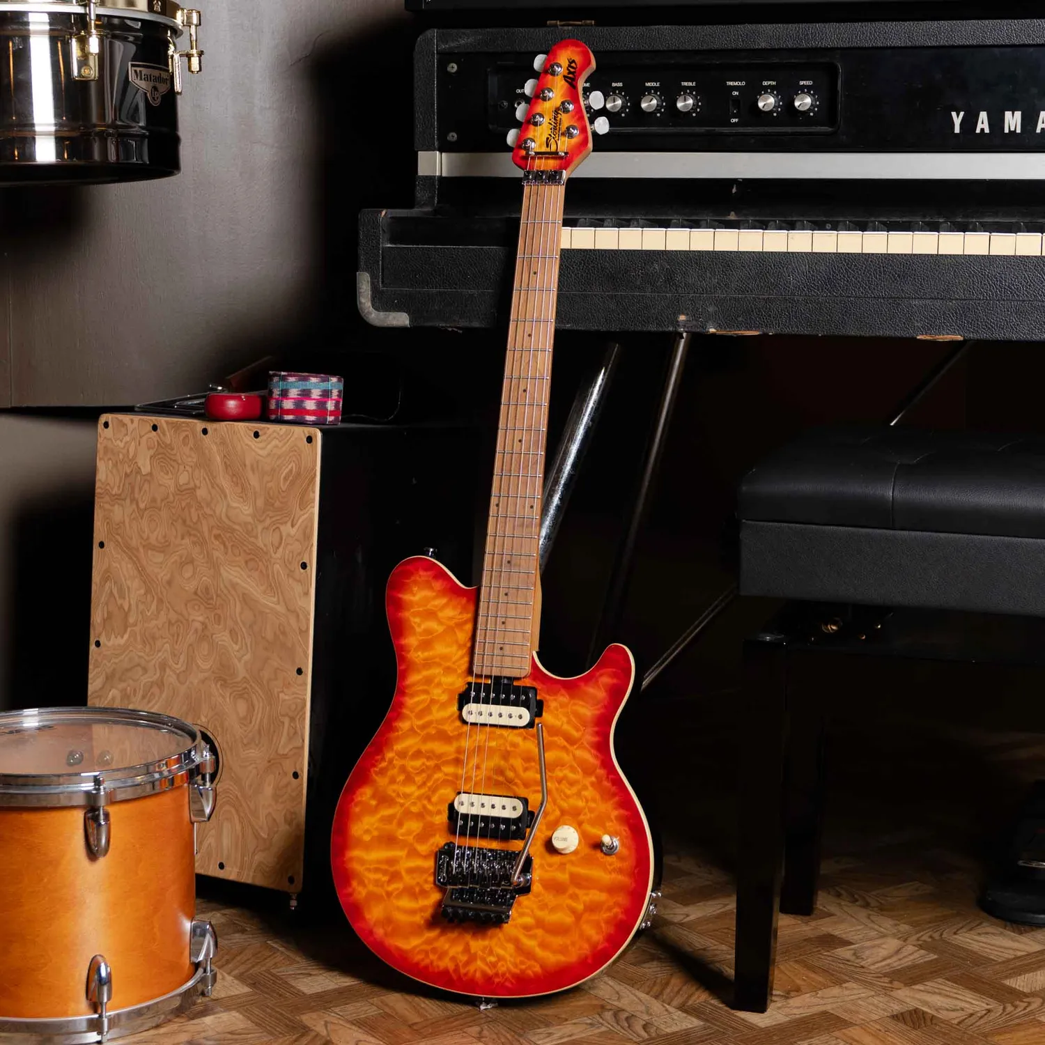 Sterling Axis E-Gitarre Lava Burst Quilt-Top Tremolo